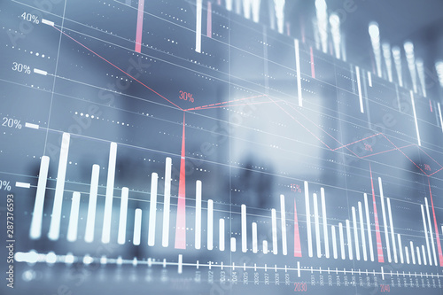 Stock market chart with trading desk bank office interior on background. Double exposure. Concept of financial analysis © Andrey