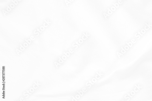White cloth background abstract. Fabric is wrinkled and sofe wave. Material are used in textile assembly.