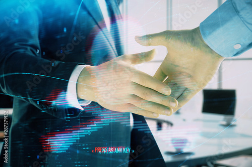 Double exposure of hacking theme hologram on office background with two men handshake. Concept of data security