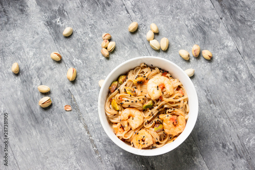 Shrimps with soba noodles and shrimps - asian food creative concept.