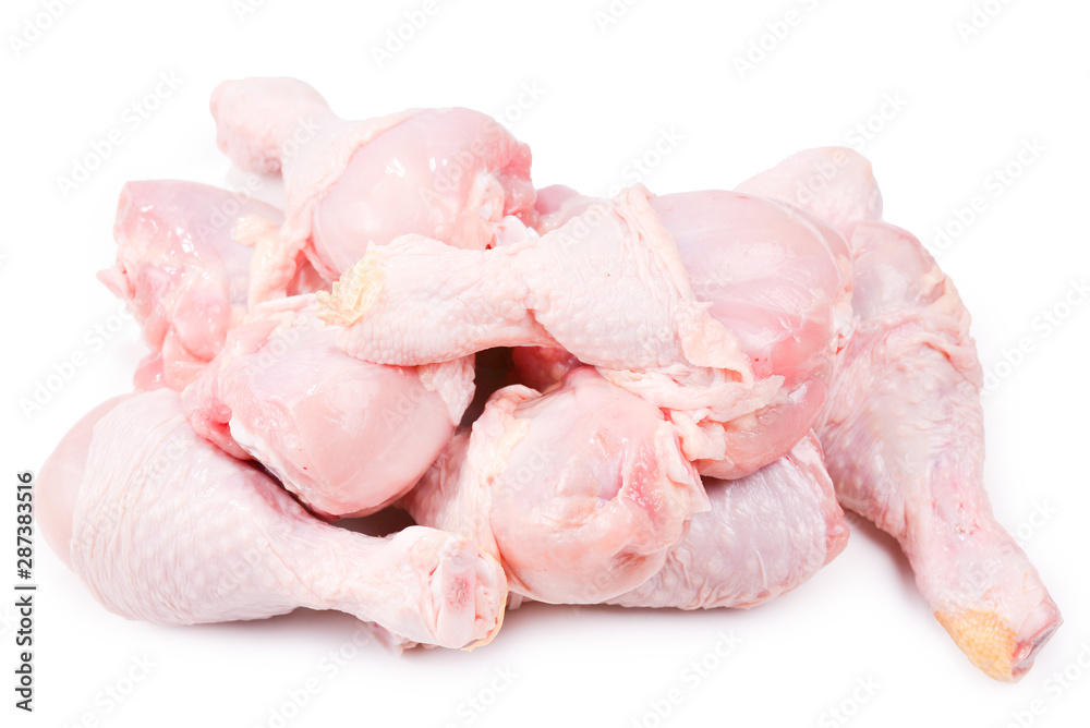 Tasty raw chicken legs. Top view. Isolated on white Tasty raw chicken legs. Top view. Isolated on white
