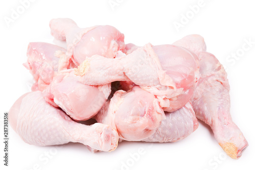 Tasty raw chicken legs. Top view. Isolated on white