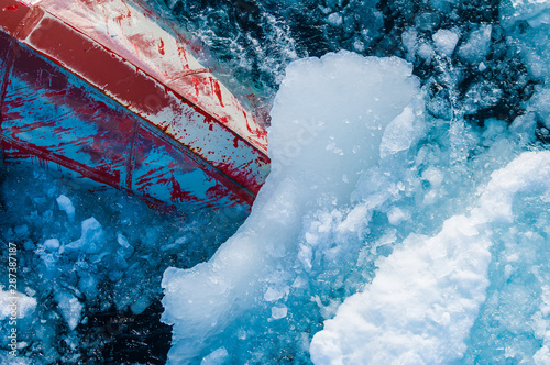 Bow of ice breaker going through ice in the Arctic Circle. photo
