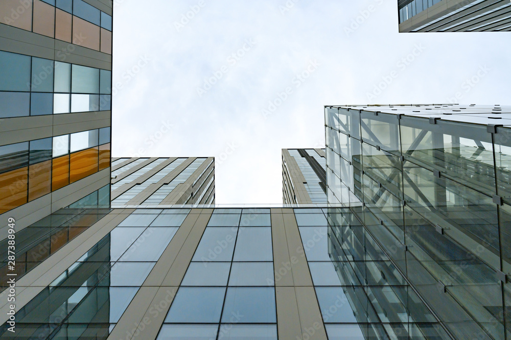 Obraz premium Skyscraper glass curtain wall, modern office building in Qingdao, China
