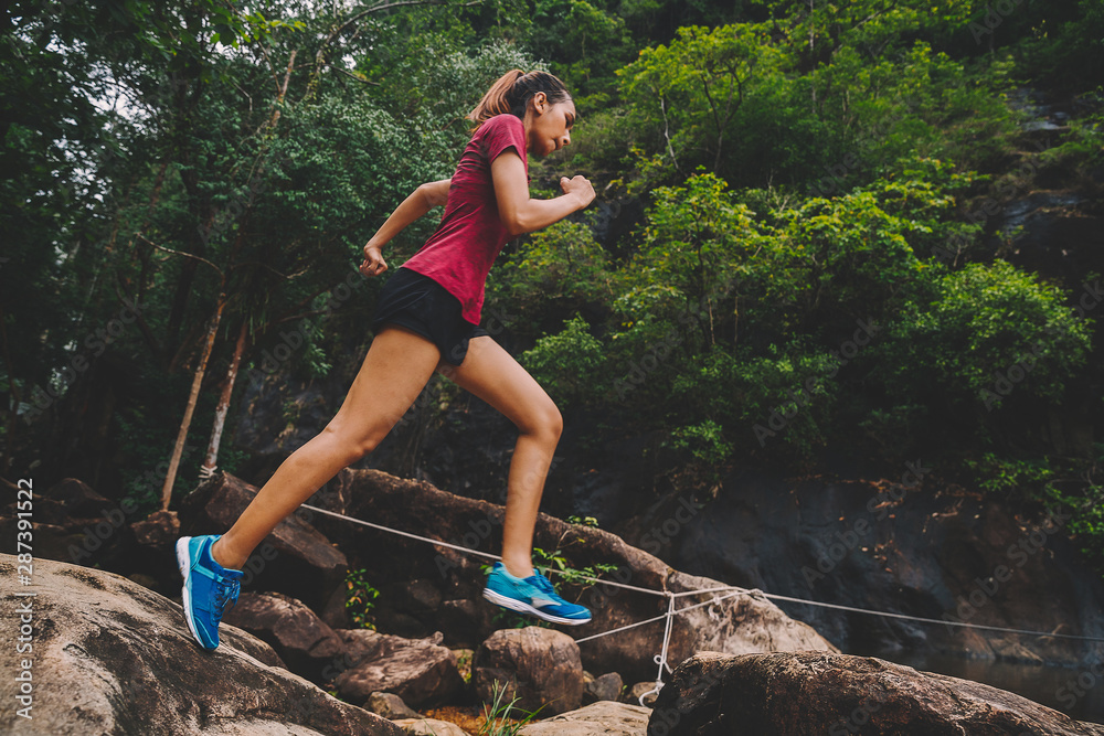 custom made wallpaper toronto digitalRunners. Young people trail running on a mountain path. Adventure trail running on a mountain. Runners receive injuries from running trails on a mountain