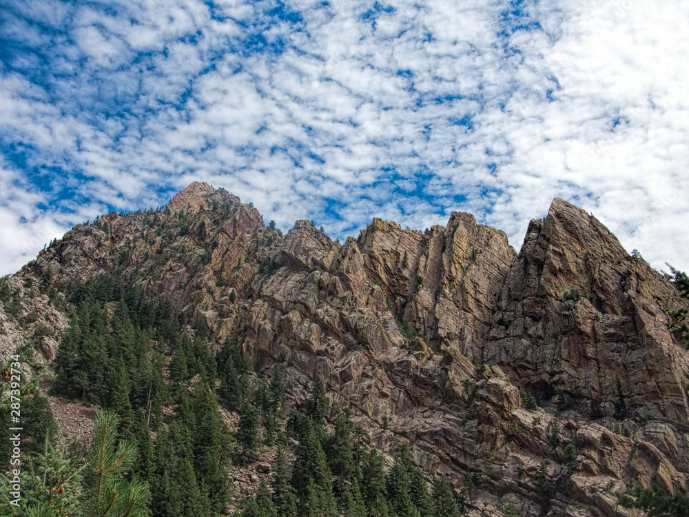 Rocky Mountain Peaks Under Beautiful Clouds