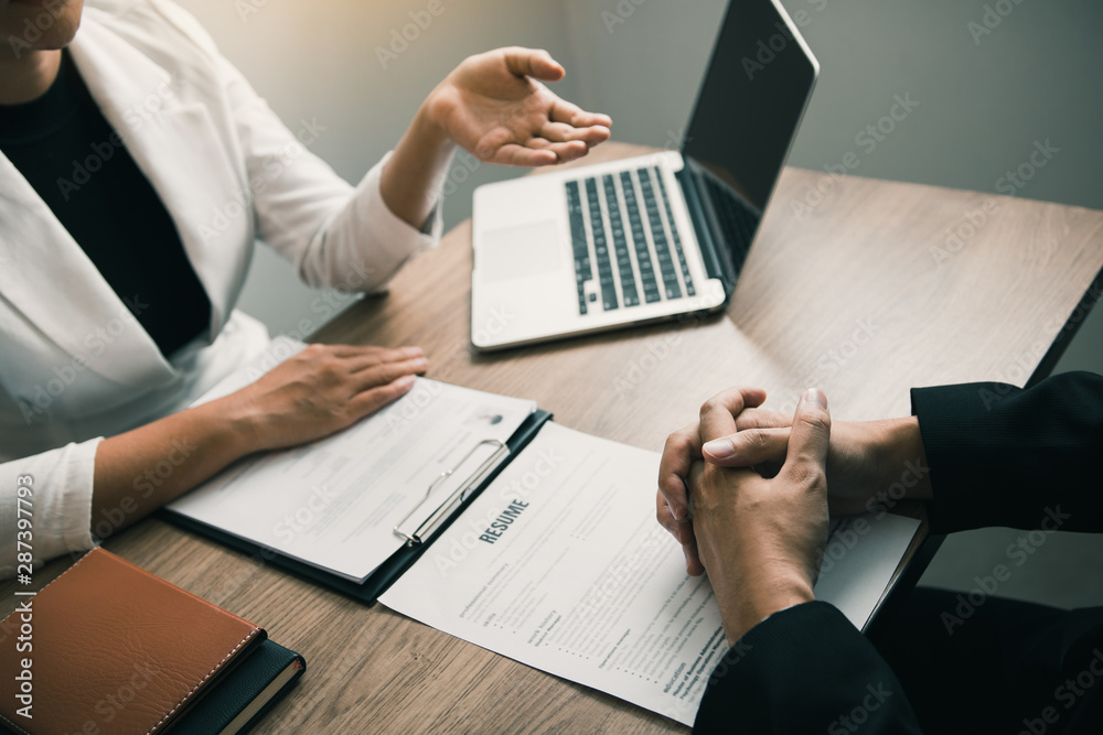 Female managers are talking about the recruitment of staff at the office. Female managers are talking about the recruitment of staff at the office.