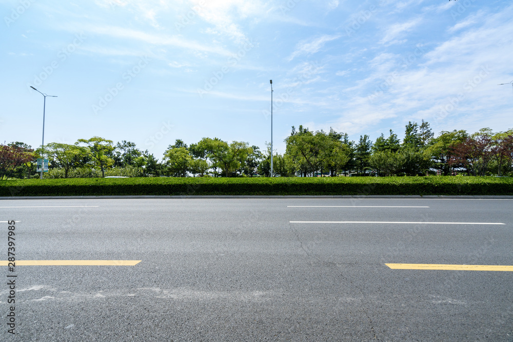 Highway and lush forests outdoors, Qingdao, China