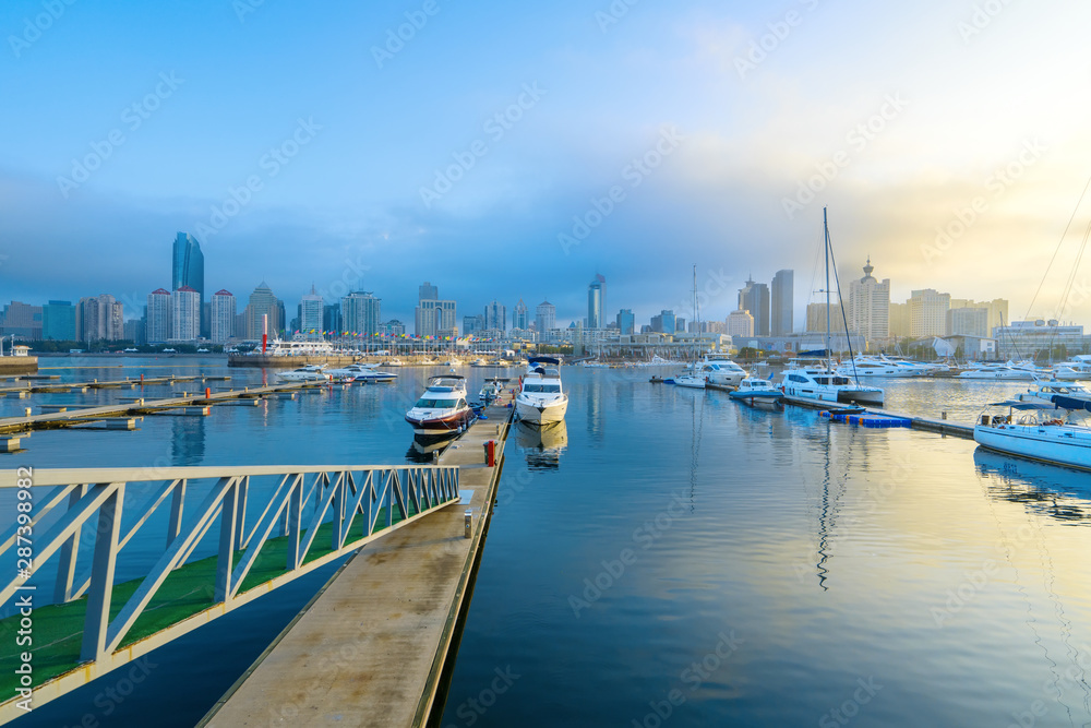 Sailing boats dock at the Olympic Sailing Center Pier in Qingdao, China