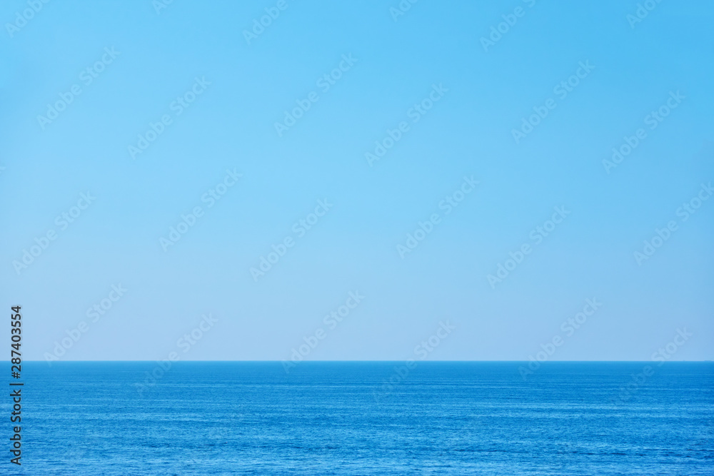 Sea horizon and clear blue sky