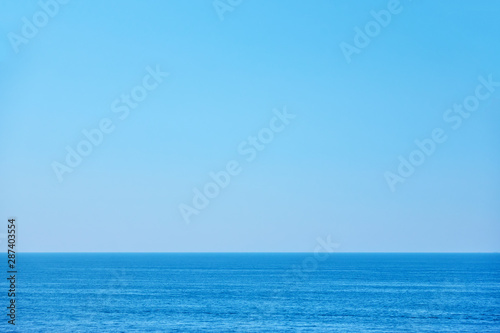 Sea horizon and clear blue sky