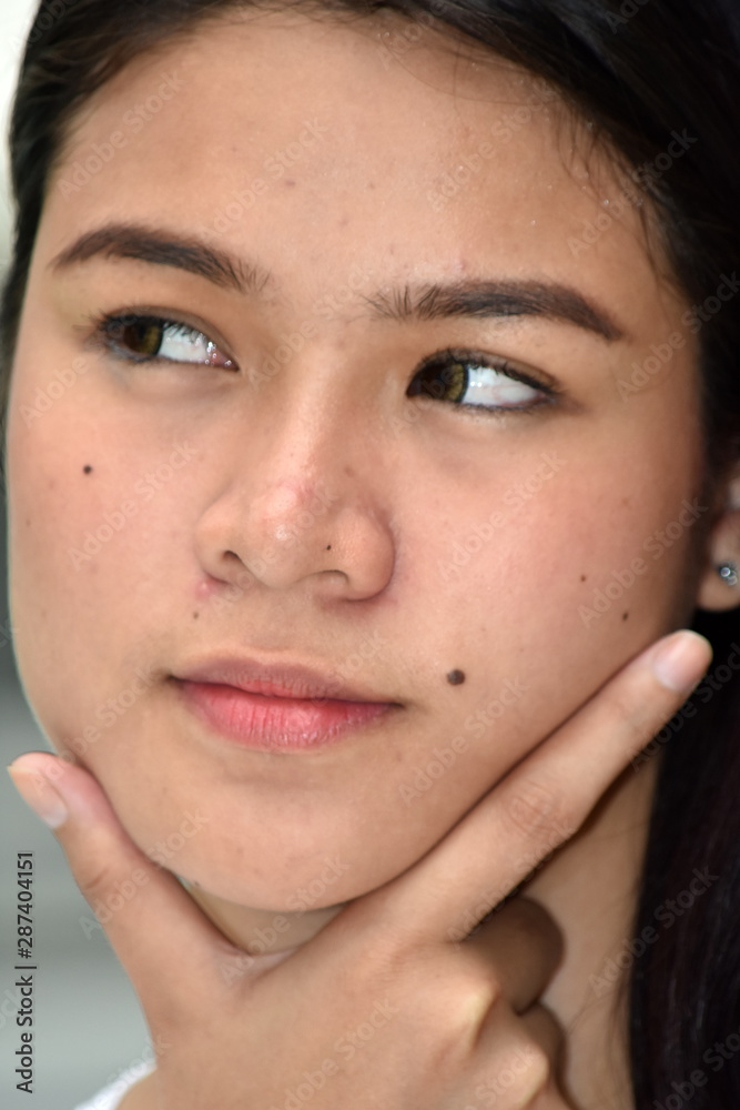 A Thoughtful Attractive Diverse Female Woman A Thoughtful Attractive Diverse Female Woman