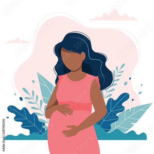 Canvas Print Black pregnant woman with nature and leaves background