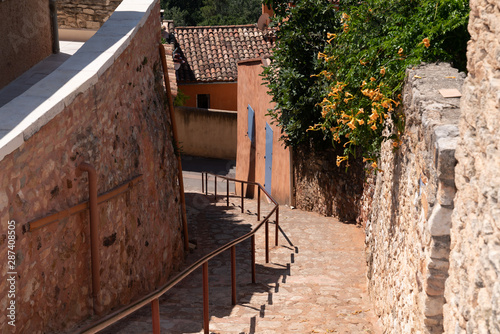 red and ocher stairs in the village of Roussillon in Vaucluse Luberon in France