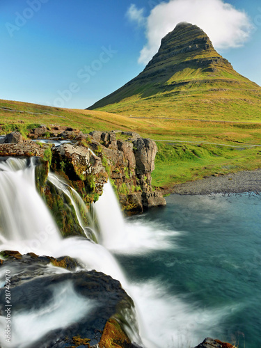 Waterfall in the mountains. Iceland