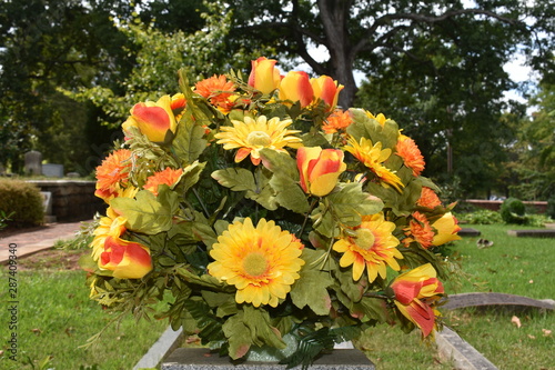 A bouquet of bright flowers in cemetery