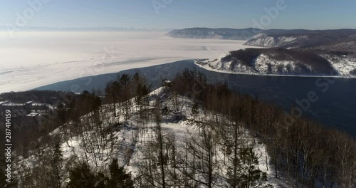 Wallpaper Mural Aerial: Beautiful mountains by Baikal frozen lake against sky during winter - Lake Baikal, Russia Torontodigital.ca