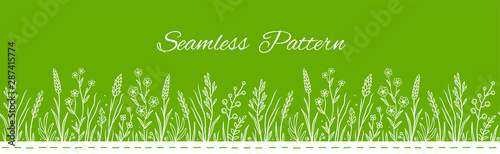 green seamless pattern with wild flowers and herbs