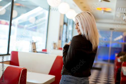 Young woman standing in the...