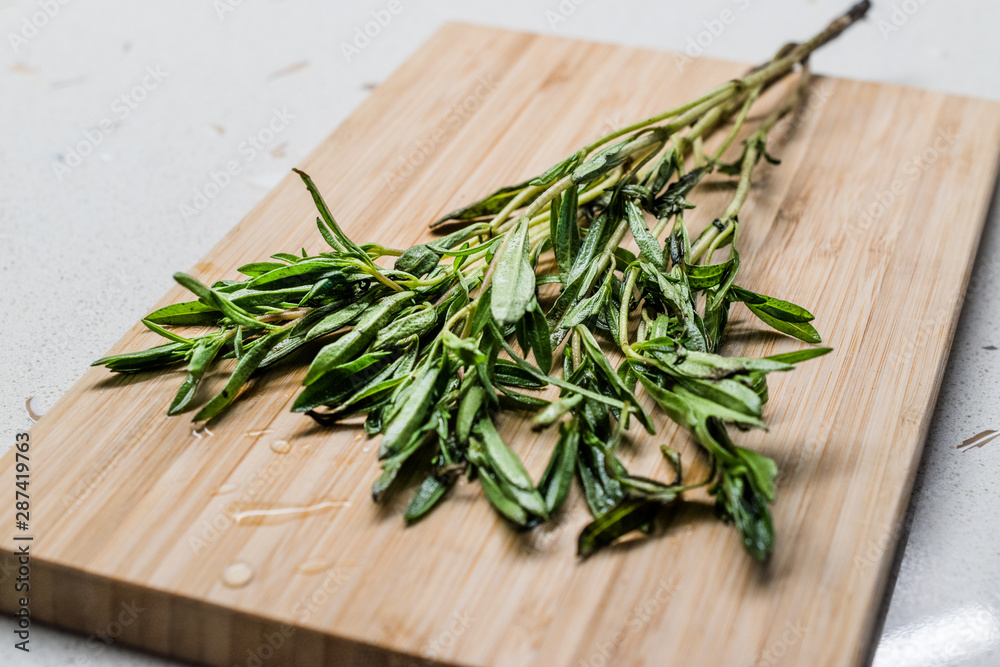 Fresh Thyme Herb Leaves in Bunch with Wooden Board Ready to Use. Fresh Thyme Herb Leaves in Bunch with Wooden Board Ready to Use.