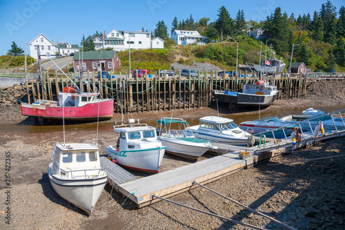Low tide  fishing boats at Hall's Harbour on the Bay of Fundy, Nova Scotia.