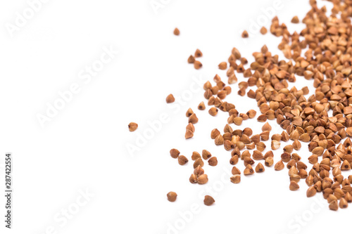 Organic buckwheat close up and top view, food background with space for text