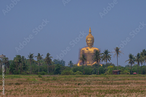 The new golden coloring work of Big Buddha in Ang Thong province The largest Buddha statue in Thailand And the largest in the world. photo