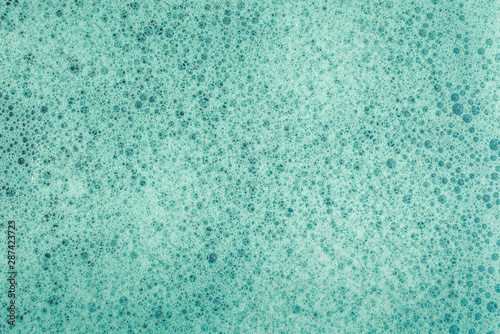 Soap bubbles background- suds liquid