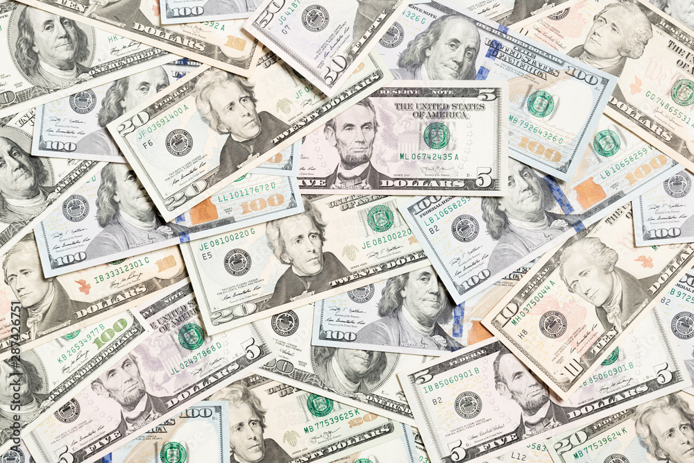 Top view of various dollar cash background. Different banknotes concept. Wealth and rich concept Top view of various dollar cash background. Different banknotes concept. Wealth and rich concept