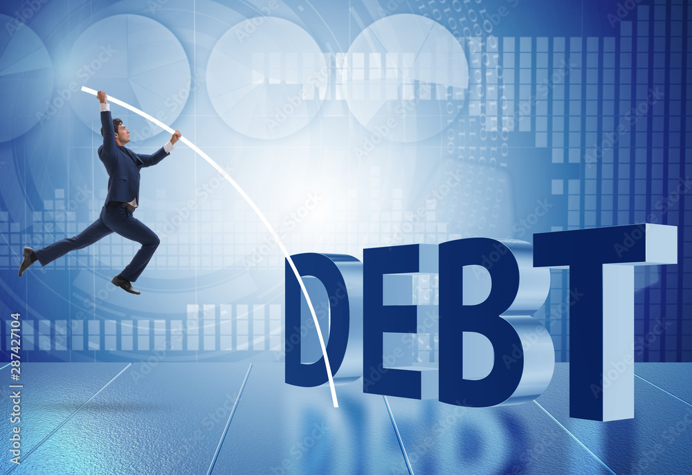 Businessman avoiding debt burden in business concept Businessman avoiding debt burden in business concept