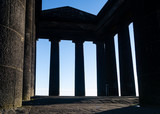 Penshaw Monument, showing the inside of the landmark based in Sunderland with the columns/pillars silhouetted against the blue Spring sky.
