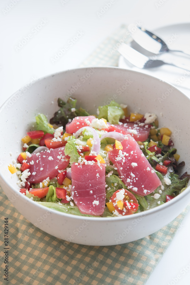 Rare seared ahi tuna slices with fresh vegetable Rare seared ahi tuna slices with fresh vegetable