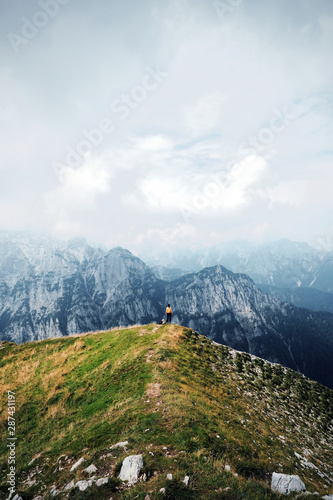 people in mountains, background alps, wonderful travel concept, space for text, atmospheric epic moment