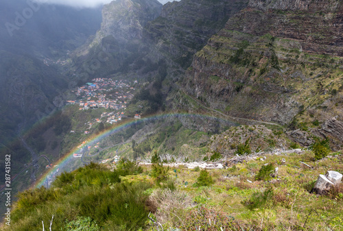Rainbow over Valley of the Nuns, Curral das Freiras on Madeira Island, Portugal