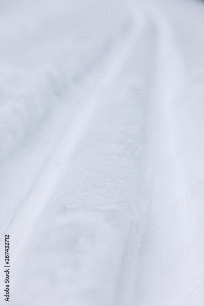 Obraz premium Long ski tracks in a deep snow