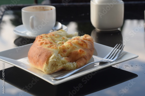 breakfast with croissants and coffee