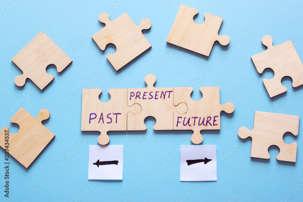 Words Past, Present and Future written on wooden puzzles, time concept. Words Past, Present and Future written on wooden puzzles, time concept.
