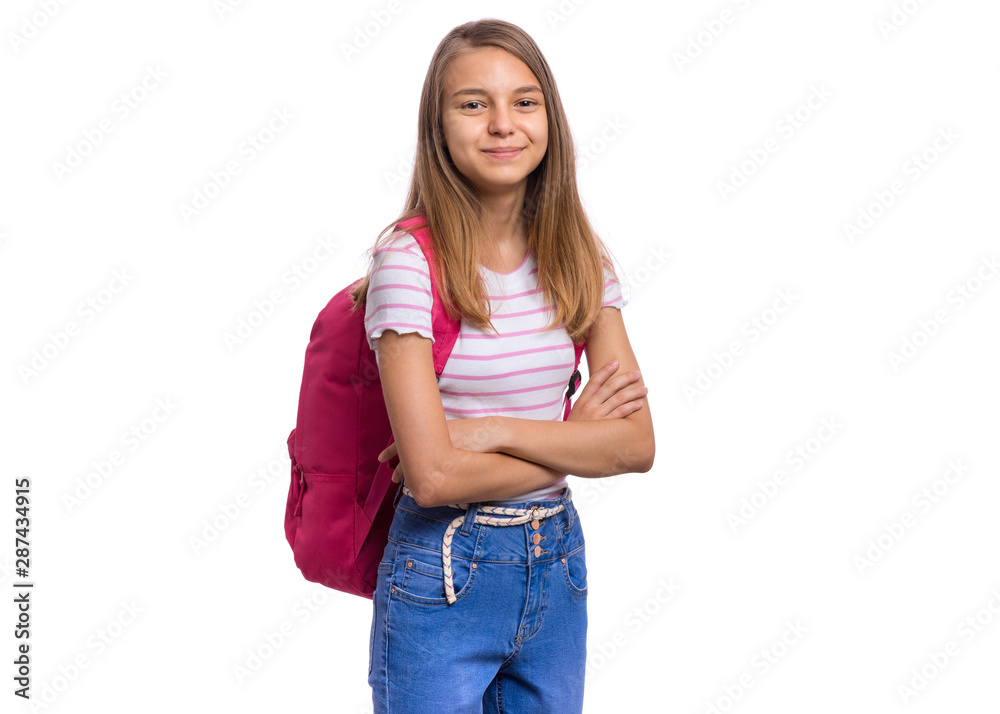 Fototapeta premium Beautiful student teen girl with backpack looking at camera. Portrait of cute smiling confident schoolgirl with folded arms, isolated on white background. Happy child with bag Back to school.