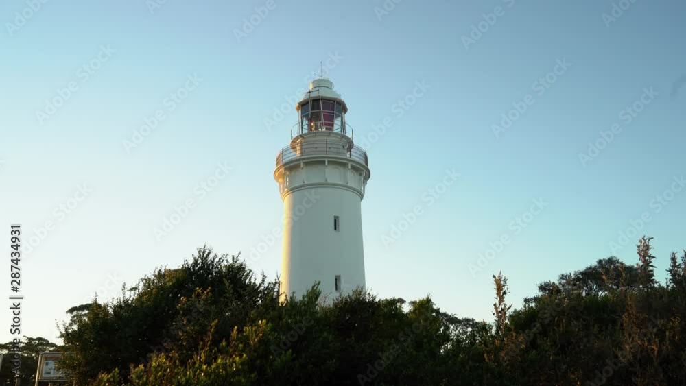 Table Cape Lighthouse During Sunset In Tasmania,Australia. Pan Left, low angle Table Cape Lighthouse During Sunset In Tasmania,Australia. Pan Left, low angle