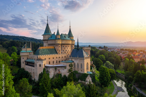 Aerial view of Bojnice medieval castle, UNESCO heritage in Slovakia. Romantic castle with Gothic and Renaissance elements built in 12th century.