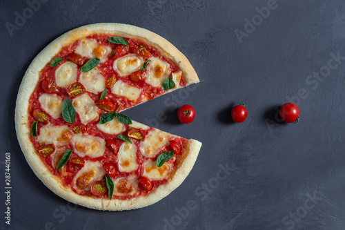 Bild auf Leinwand Pacman pizza margherita on a black background
