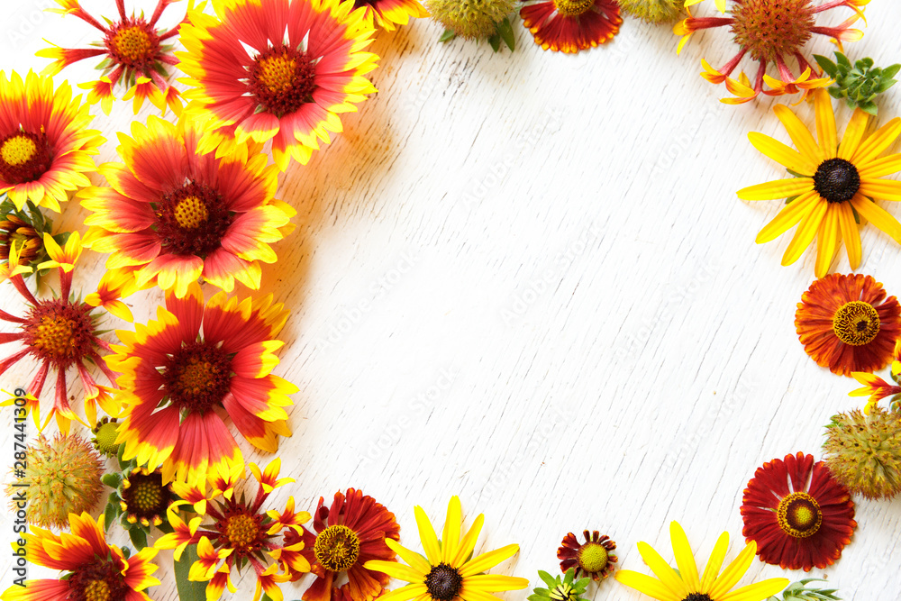 Flower composition on a wooden white background Flower composition on a wooden white background