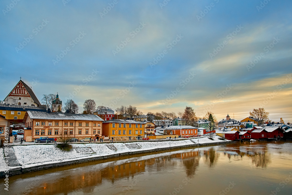 Fototapeta premium Old historic Porvoo, Finland with wooden houses and medieval stone and brick Porvoo Cathedral at blue hour sunrise