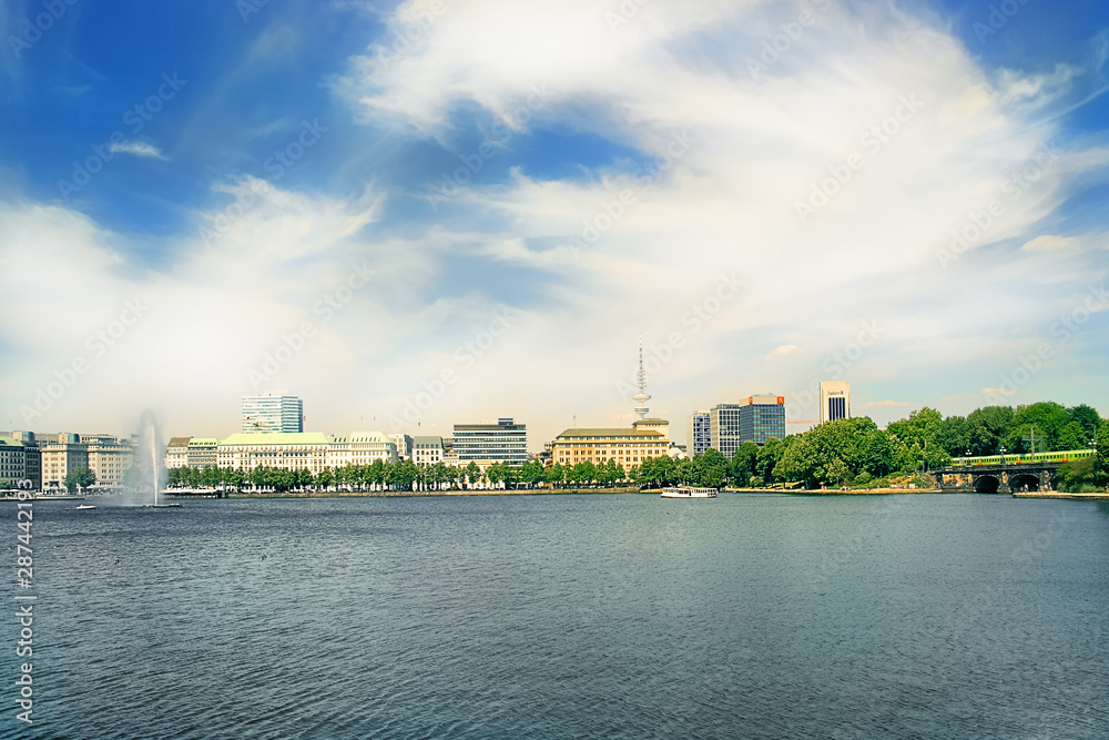 Beautiful sunny summer day at the Alster lake in Hamburg, Germany Beautiful sunny summer day at the Alster lake in Hamburg, Germany