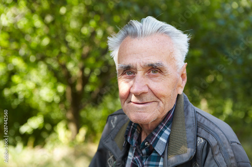 Elderly poor man thinks about life