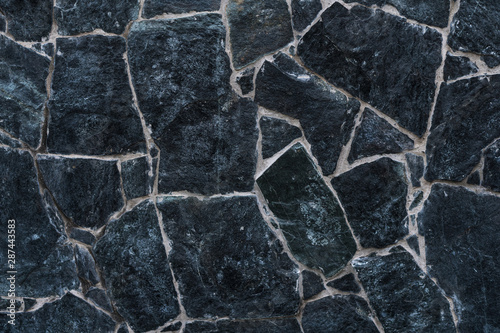 texture - wall of unpolished rough stone