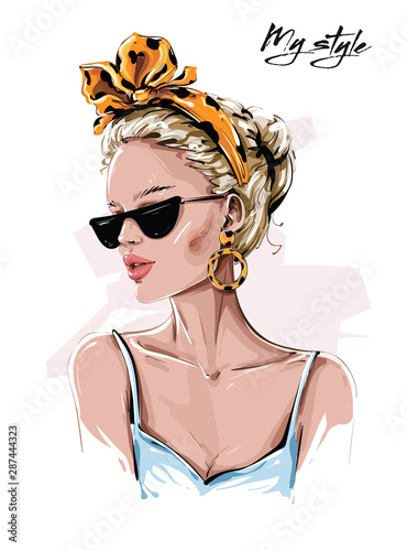 Hand drawn beautiful young woman in sunglasses. Stylish girl in headband with leopard print. Fashion woman look. Sketch. Vector illustration.[]