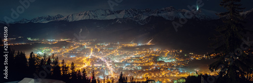 Aerial panorama of Zakopane and Tatry mountains at night