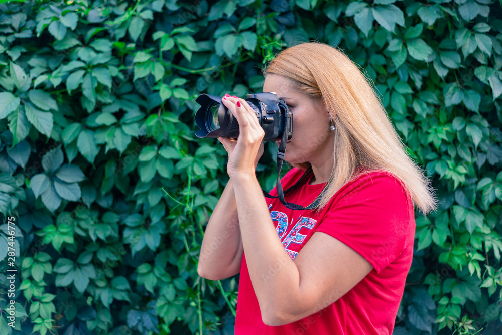 young girl photographer with a camera young girl photographer with a camera