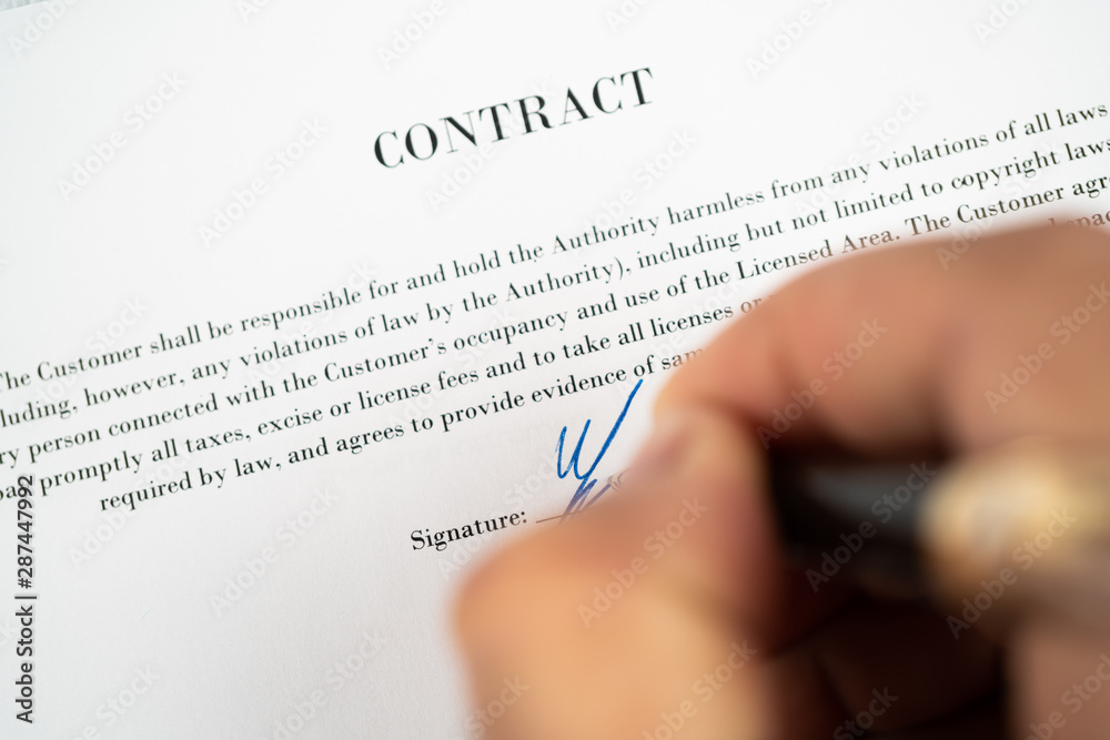 signing a contract close up